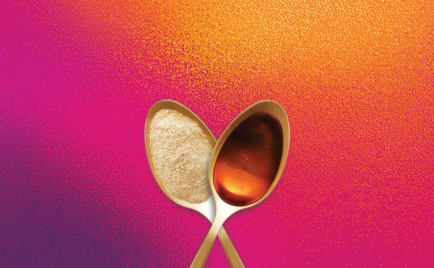 Liva palm sugar and syrup in golden spoons on pink and yellow gradient background